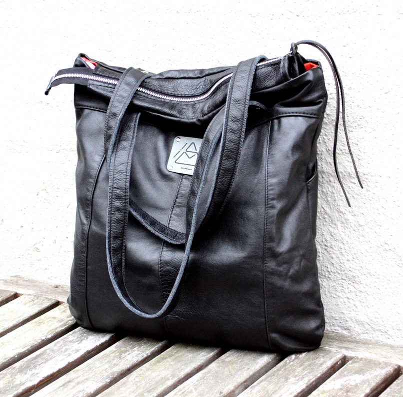 Black city bag made out of a pair of leather trousers. – byBessert